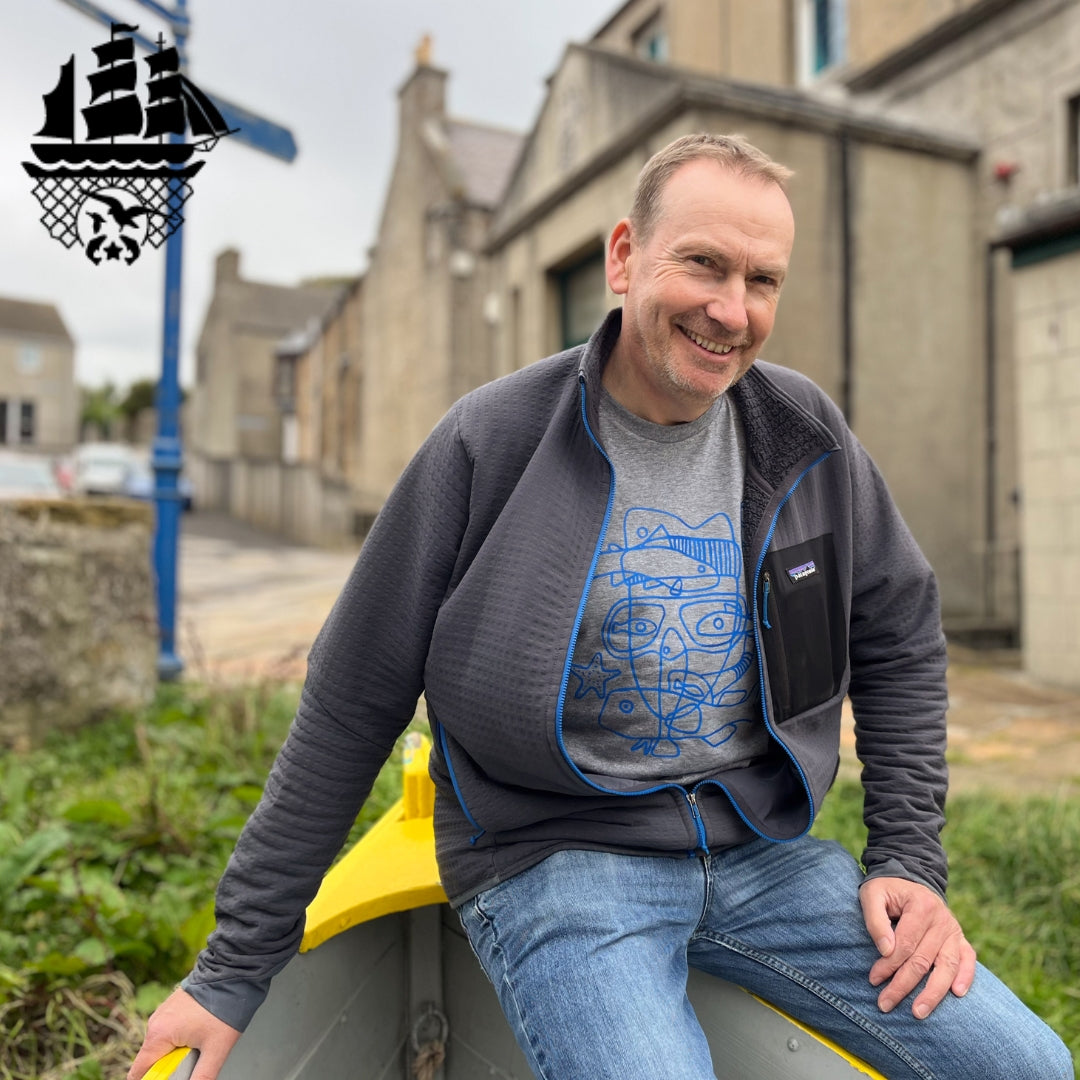 Colin Kirkpatrick wearing the t-shirt he designed for the 'Steps to Sustainability' project 